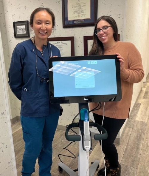 members of dental staff smiling
